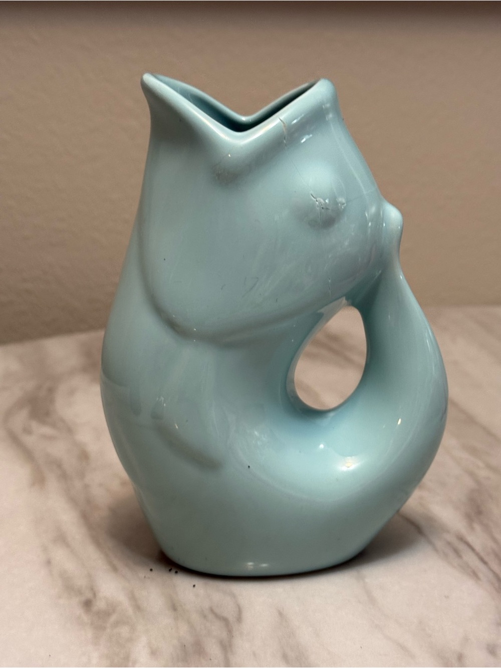 GurglePot fish-shaped ceramic pitcher with a glossy finish of light blue